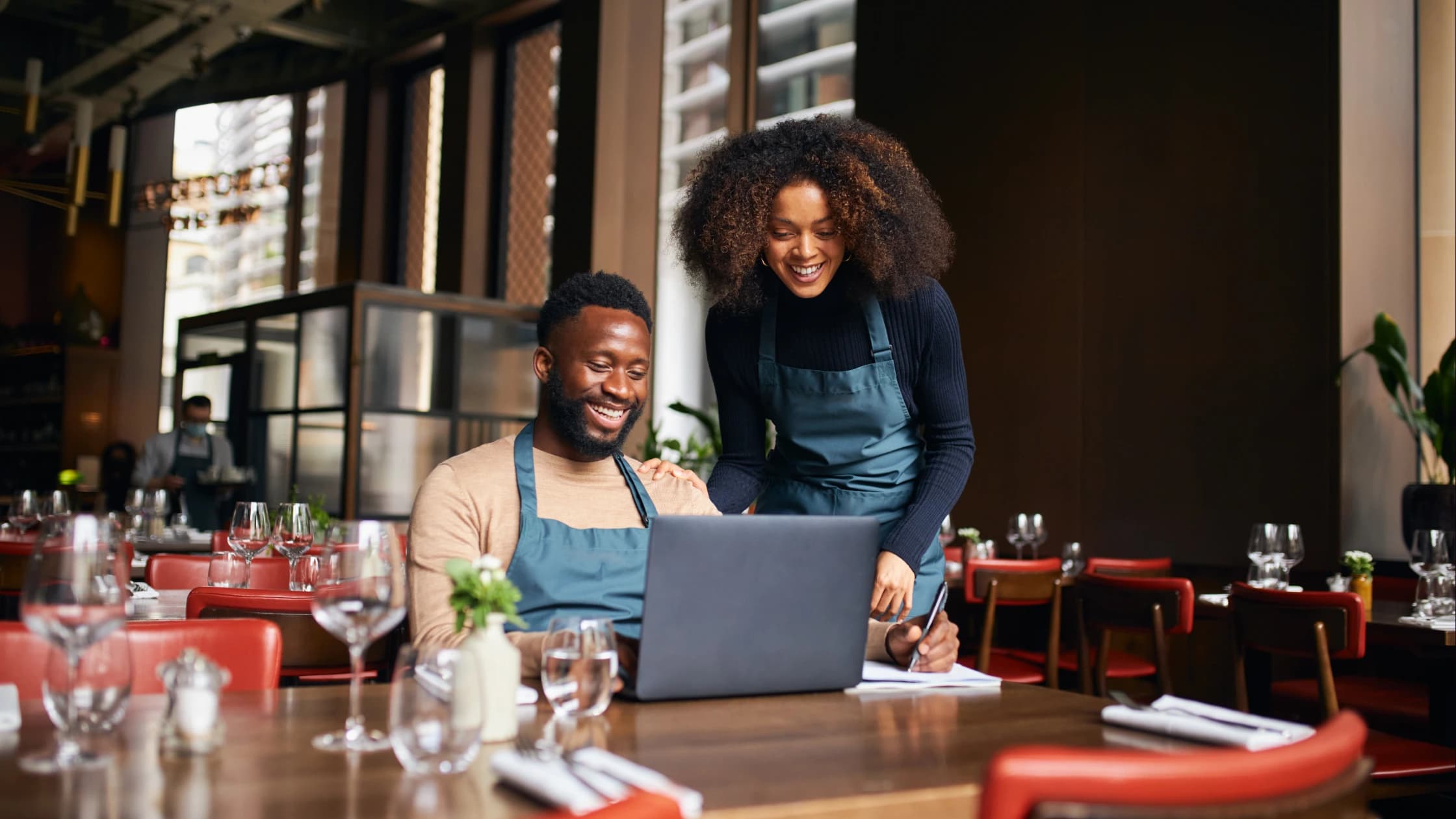 Restaurant owners managing their business together