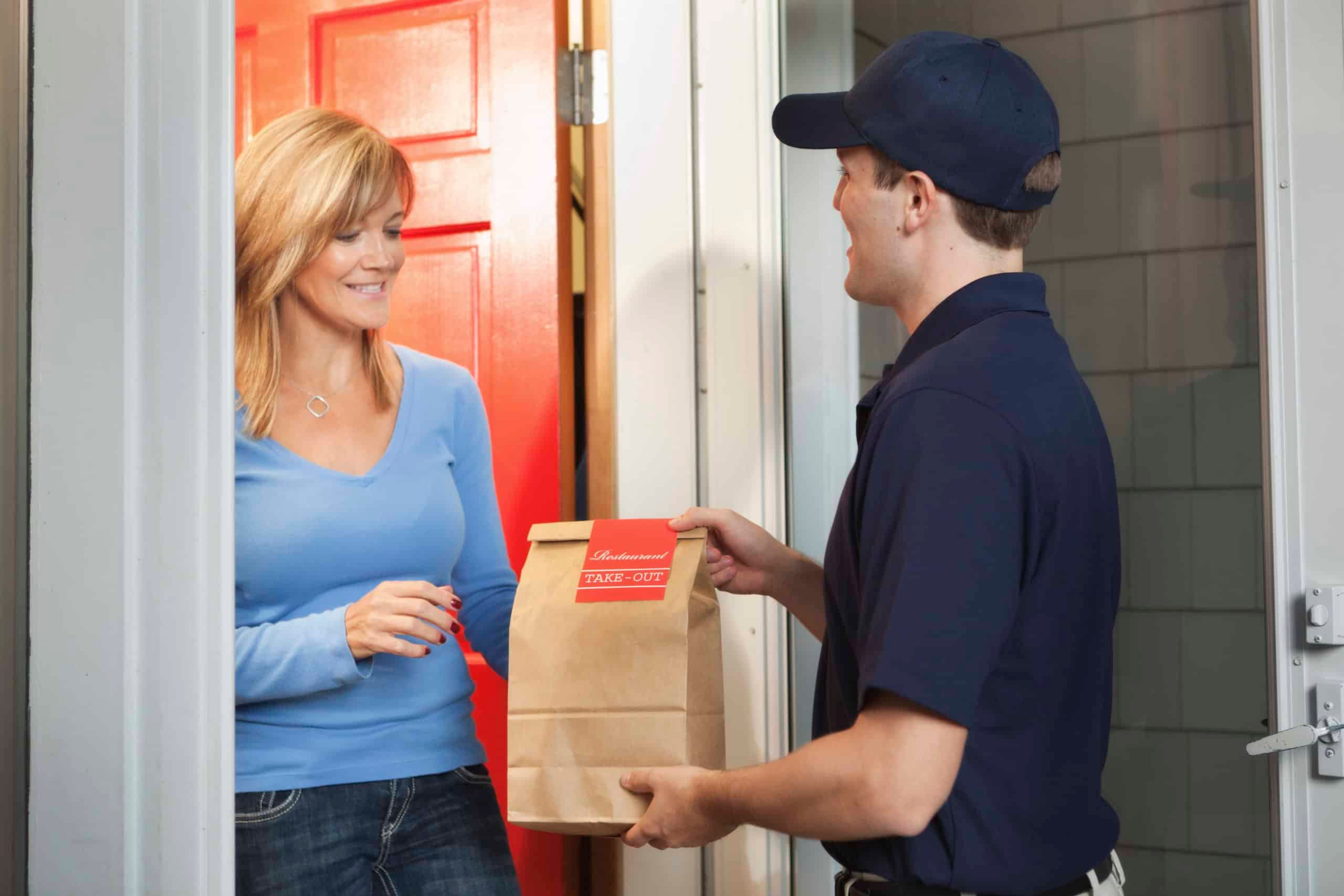 A restaurant order being delivered to a customer